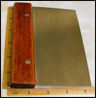 Steel soap cutter with straight edge